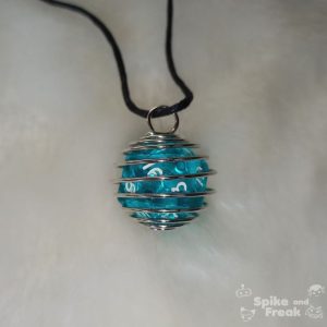 Dado espiral grande turquesa