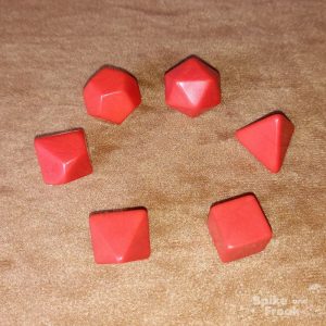6 dados RPG en blanco. Color rojo